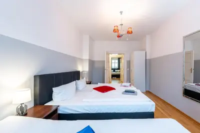 Ein Bett oder Betten in einem Zimmer der Unterkunft Grand Central City Apartments Mitte Rosenthaler Platz