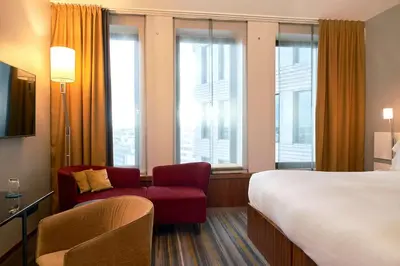 Ein Bett oder Betten in einem Zimmer der Unterkunft Dorint Kurfürstendamm Berlin