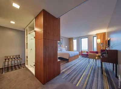 Ein Bett oder Betten in einem Zimmer der Unterkunft Dorint Kurfürstendamm Berlin