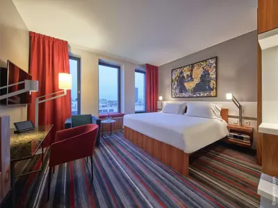 Ein Bett oder Betten in einem Zimmer der Unterkunft Dorint Kurfürstendamm Berlin