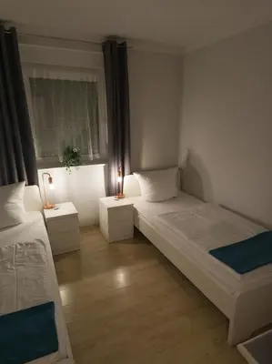 Ein Bett oder Betten in einem Zimmer der Unterkunft Ferienwohnung Nauen
