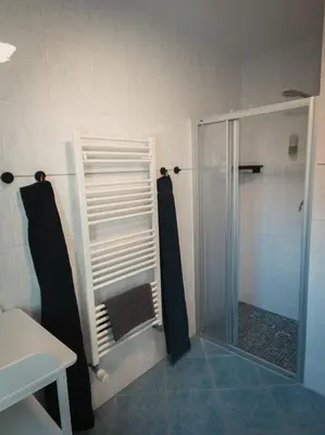 Ein Badezimmer in der Unterkunft Ferienwohnung Nauen