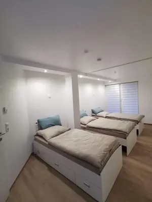 Ein Bett oder Betten in einem Zimmer der Unterkunft Haus am Nymphensee2
