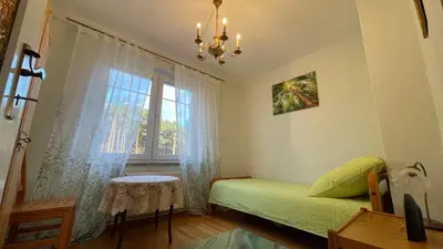 Ein Bett oder Betten in einem Zimmer der Unterkunft Ferienwohnung Magdalena