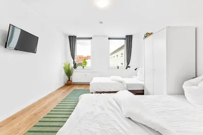Ein Bett oder Betten in einem Zimmer der Unterkunft Cosy apartment with balcony and fireplace