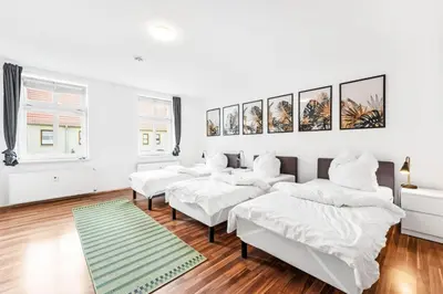 Ein Bett oder Betten in einem Zimmer der Unterkunft Cosy apartment with balcony and fireplace