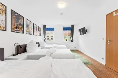 Ein Bett oder Betten in einem Zimmer der Unterkunft Cosy apartment with balcony and fireplace