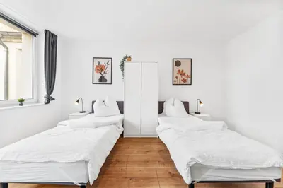Ein Bett oder Betten in einem Zimmer der Unterkunft Cosy apartment with balcony and fireplace