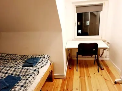 Ein Bett oder Betten in einem Zimmer der Unterkunft Apartment with parking in Berlin 11