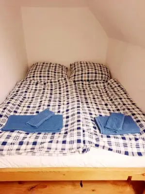 Ein Bett oder Betten in einem Zimmer der Unterkunft Apartment with parking in Berlin 11