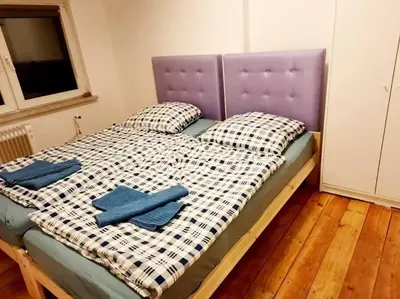 Ein Bett oder Betten in einem Zimmer der Unterkunft Apartment with parking in Berlin 11
