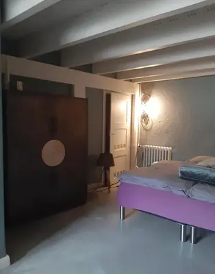 Ein Bett oder Betten in einem Zimmer der Unterkunft Ferienwohnung Bad Freienwalde