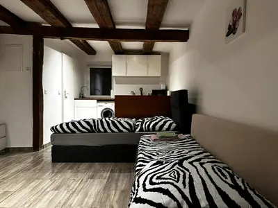 Ein Bett oder Betten in einem Zimmer der Unterkunft Nice studio in Pankow