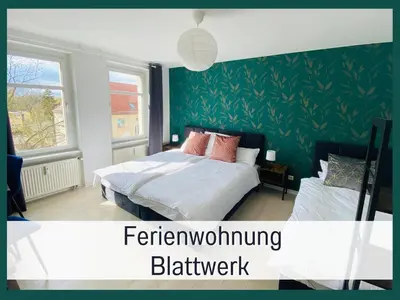 Ein Bett oder Betten in einem Zimmer der Unterkunft Stadtapartment by LivE it - voll ausgestattete Küche, SmartTV, Waschtrockner, 1-5 Pers