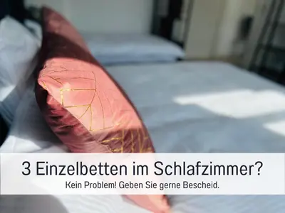 Ein Bett oder Betten in einem Zimmer der Unterkunft Stadtapartment by LivE it - voll ausgestattete Küche, SmartTV, Waschtrockner, 1-5 Pers