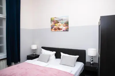 Ein Bett oder Betten in einem Zimmer der Unterkunft BIG 4ROOMS CENTRAL CITY APARTMENT KURFÜRSTENDAMM