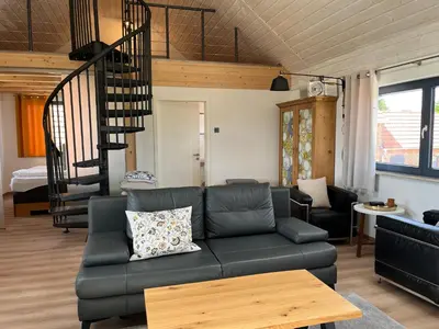 Ein Sitzbereich in der Unterkunft großzügige Ferienwohnung mit weitem Ausblick