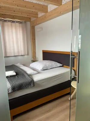 Ein Bett oder Betten in einem Zimmer der Unterkunft großzügige Ferienwohnung mit weitem Ausblick