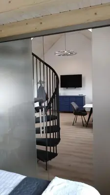 Ein Bett oder Betten in einem Zimmer der Unterkunft großzügige Ferienwohnung mit weitem Ausblick