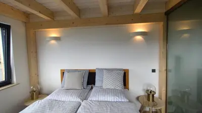 Ein Bett oder Betten in einem Zimmer der Unterkunft großzügige Ferienwohnung mit weitem Ausblick