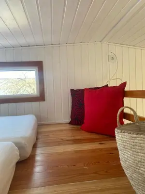 Ein Bett oder Betten in einem Zimmer der Unterkunft Tiny House 300 Meter vom Zentrum entfernt