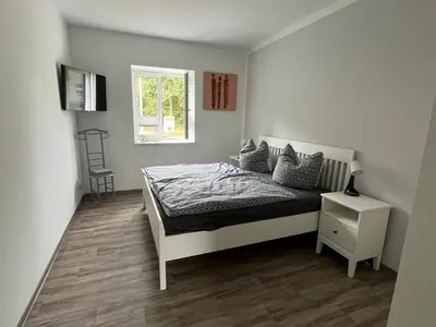 Ein Bett oder Betten in einem Zimmer der Unterkunft Ferienwohnung Kolow GbR
