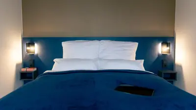 Ein Bett oder Betten in einem Zimmer der Unterkunft SpreeBlau Apartments