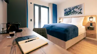 Ein Bett oder Betten in einem Zimmer der Unterkunft SpreeBlau Apartments