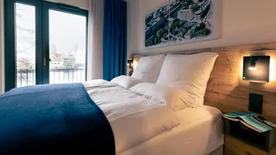 Ein Bett oder Betten in einem Zimmer der Unterkunft SpreeBlau Apartments